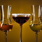 alcoholic drinks glasses black background Alcoholic drinks stock image
