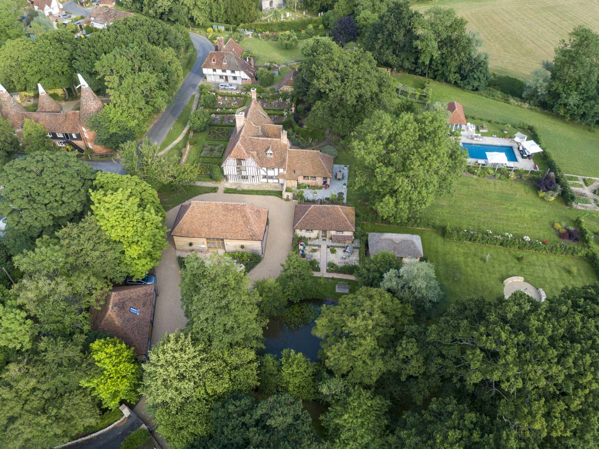 Aerial view showcasing drone photography services, potentially featuring landscape or architectural elements with vibrant colors.